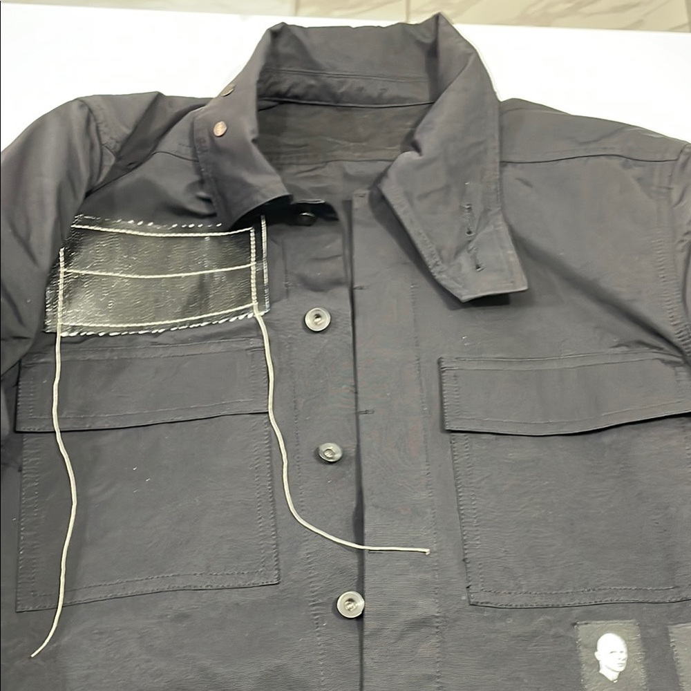 Black Button-Up Jacket with Unique Patch